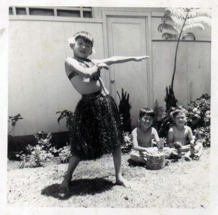 Russell in Hula Skirt with Jeff and Les